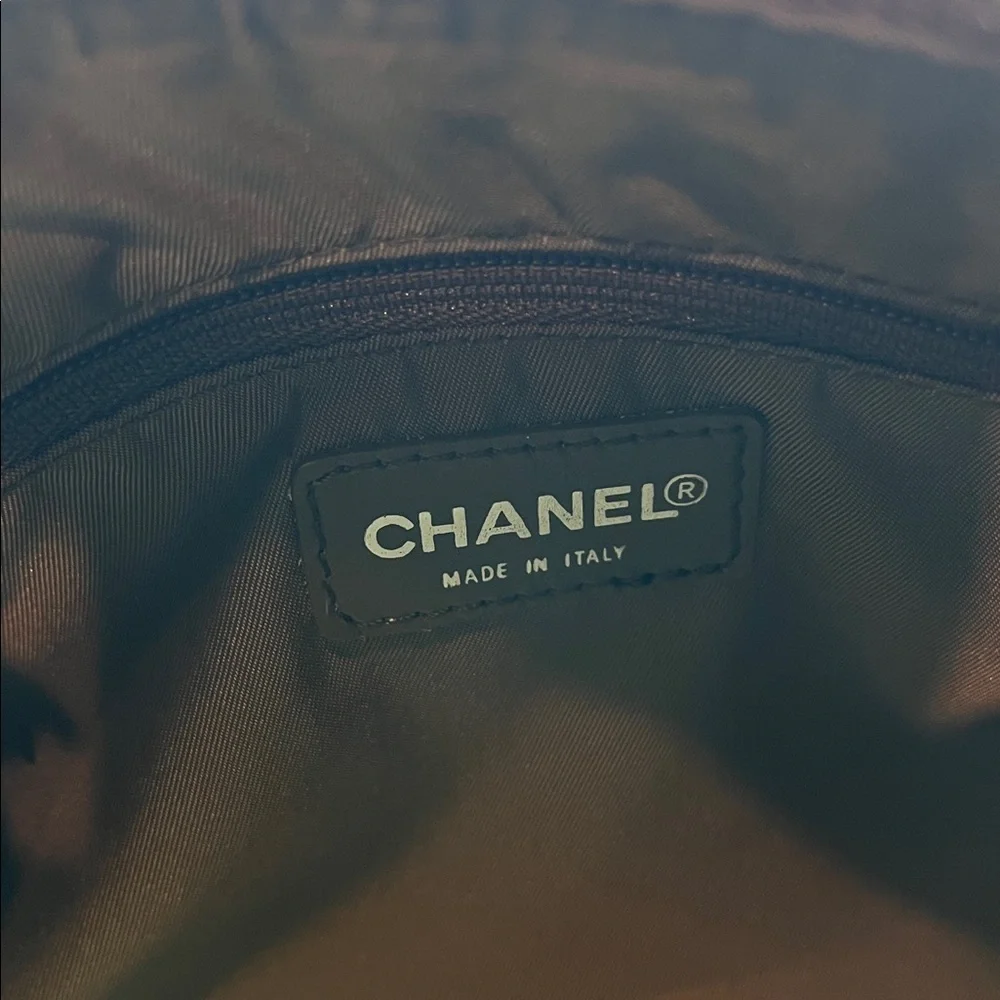 Chanel New Travel Line Mini Roll or Barrel Bag in a khaki or olive green color